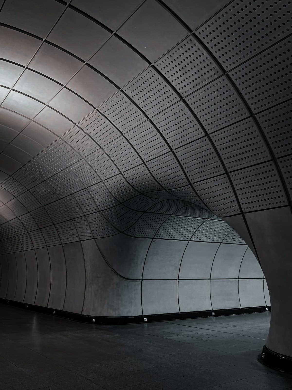 Sweeping curves in a concrete tunnel